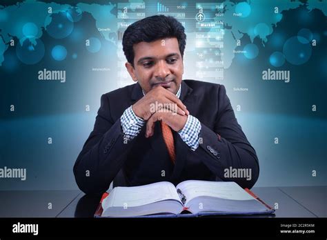 Business man with book Stock Photo - Alamy