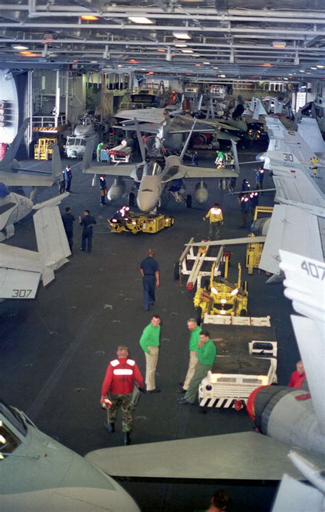 A view inside the aircraft hangar bay aboard aircraft carrier USS ...