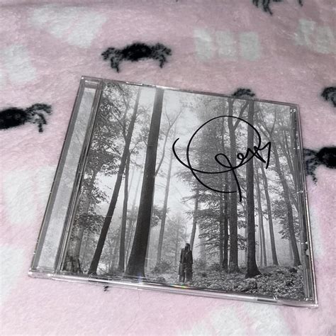 Signed Taylor Swift Folklore Album has only been... - Depop