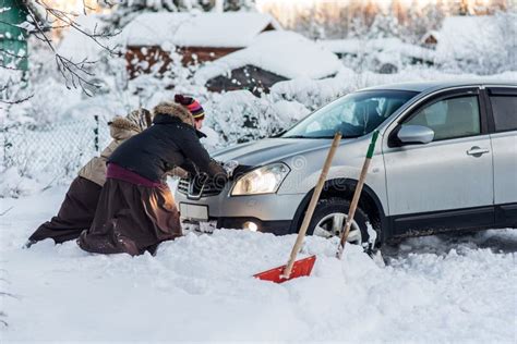 Two Men Pushing Car Stuck Snow Stock Photos - Free & Royalty-Free Stock ...