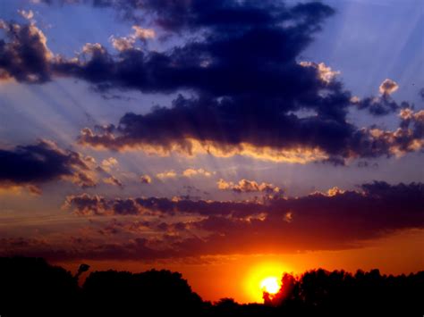 1360x768 wallpaper | black clouds during sunset | Peakpx