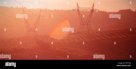 The evening electricity pylon silhouette Stock Photo - Alamy