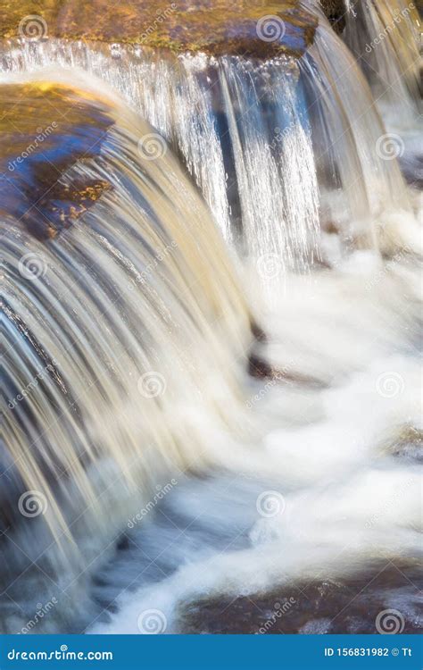 Waterfall in a creek stock photo. Image of leaves, cascade - 156831982