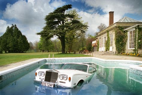 Michael Spencer Jones: Oasis - Be Here Now - Rolls Royce in pool - Snap ...