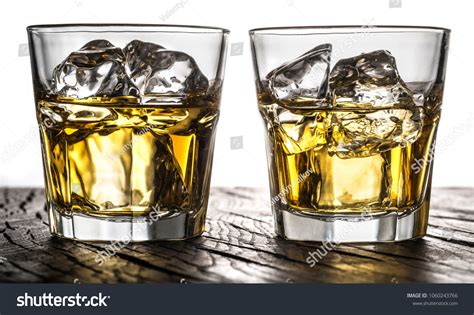 Whiskey Glasses Glasses Whiskey Ice Cubes Stock Photo 1060243766 ...