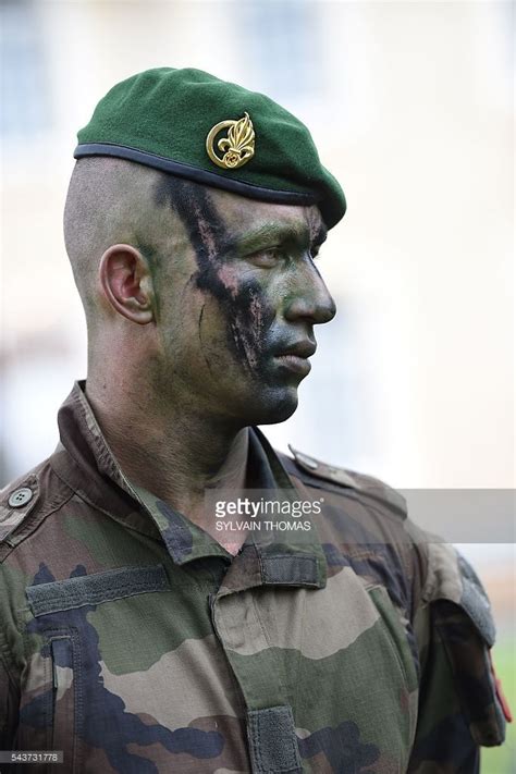 A legionnaire stands on June 17, 2016 in the La Cavalerie military camp southern France. As of J ...