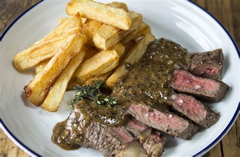 Ribeye steak and peppercorn sauce with chips | Tesco Real Food