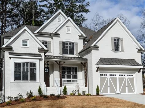 Farmhouse style Home with painted brick built by Atlanta Homebuilder ...