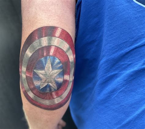 Captain America Shield Elbow Tattoo | Shield tattoo, Captain america shield tattoo, Elbow tattoos