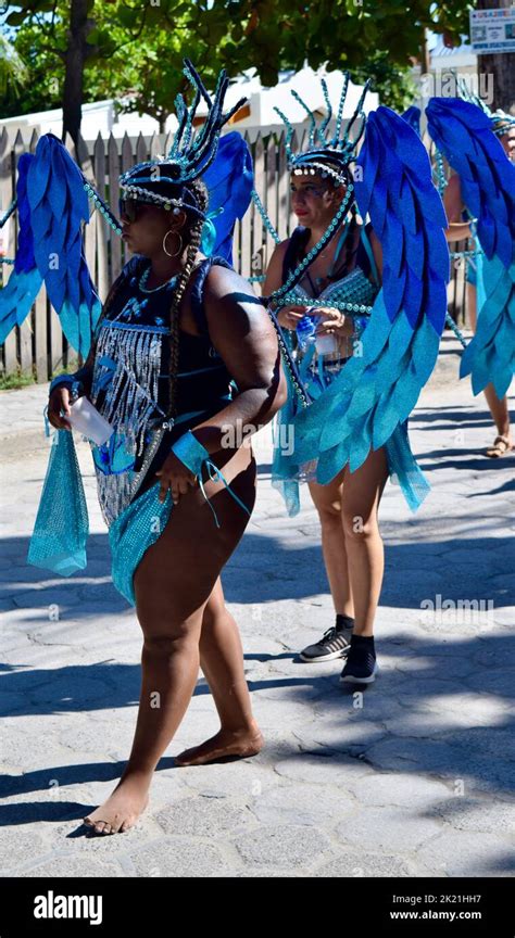 Two young Belizean women taking part in the San Pedro, Belize Carnival ...