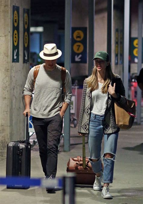 Melissa Benoist and Chris Wood Arrives in Vancouver | GotCeleb