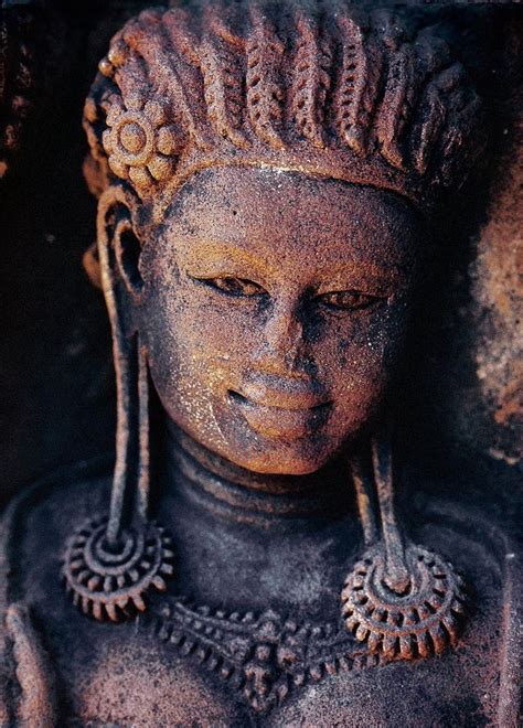 Close up of a devata figure carved at Banteay Srei, a 10th-century ...