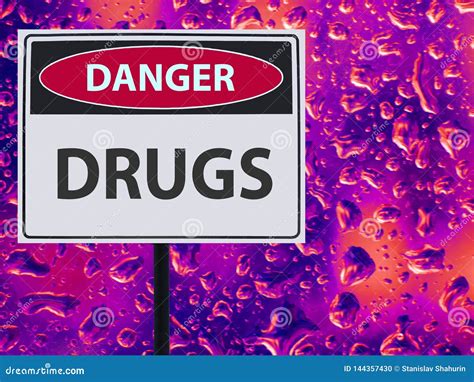 Sign Danger Drugs and Neon Drop on the Glass. Stock Photo - Image of ...