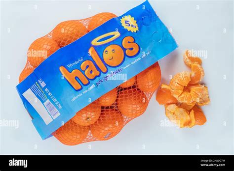 June 19, 2021. New York. Halos fresh tangerine in bag on white ...