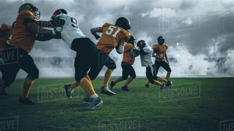 American Football Field Two Teams Play - Stock Photo - Dissolve