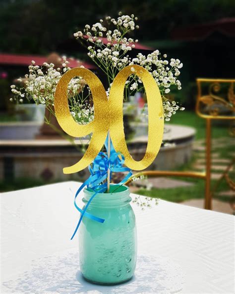 Mint and gold centerpieces for a simple and elegant 90th birthday surprise set up put together ...