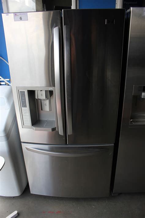 SCRATCH & DENT LG STAINLESS STEEL AND GREY FRENCH DOOR FRIDGE WITH ROLL OUT FREEZER AND WATER ...