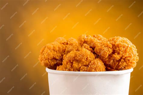 Premium Photo | Crispy fried chicken in the bucket Chicken bucket