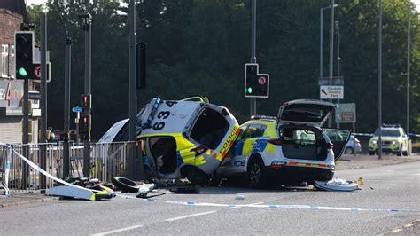 Two police cars crash on West Derby road in Liverpool leaving four ...