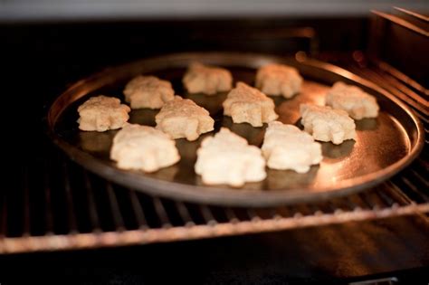 Christmas cookies baking in the oven - Free Stock Image