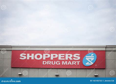 Shoppers Drug Mart Logo in Front of Their Store in Downtown Ottawa, Ontario. Editorial ...