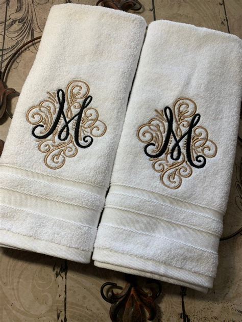 "MONOGRAM LUXURY IVORY BATH TOWELS Spruce up your bathroom with beautiful monogrammed towels ...