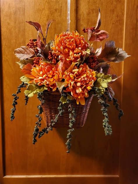 Wicker hanging basket with mixed berries and yellow/orange flowers | Orange flowers, Hanging ...