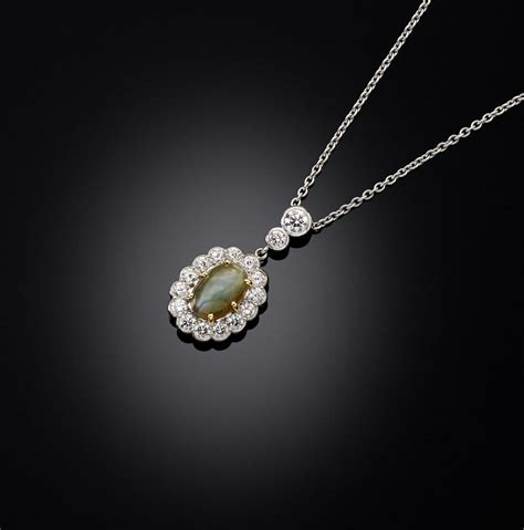 Cat's eye chrysoberyl and diamond pendant | BADA