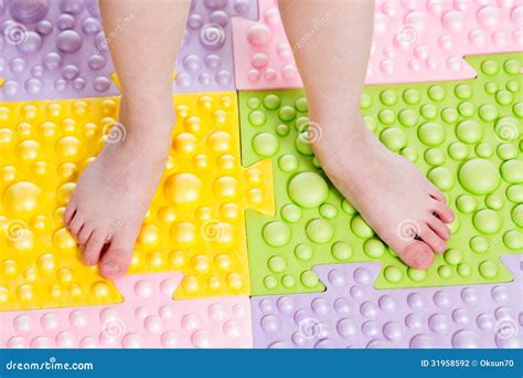 Kid feet on massaging mat stock photo. Image of healthcare - 31958592