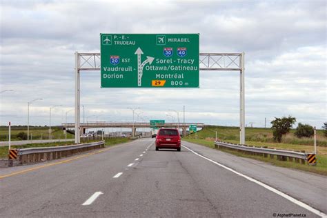 Second overhead signage for the Autoroute 30 interchange. A ...