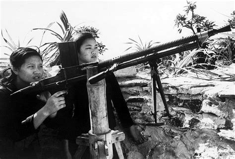 Vietnam War 1965 - Two young North Vietnamese girls learn … | Flickr