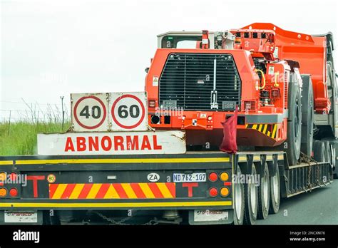 Abnormal truck load with a heavy vehicle or machine on a trailer in ...