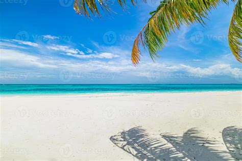 Panoramic landscape view of white beach sand sea water and blue sky clear background. Tropical ...