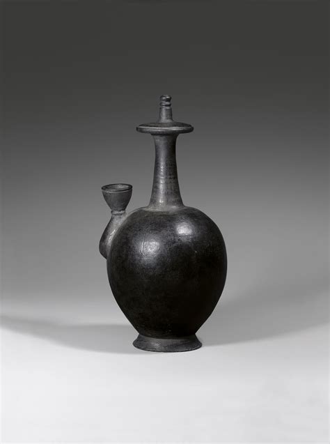 A BURNISHED BLACK POTTERY BUDDHIST RITUAL VESSEL (KUNDIKA) / J.J. Lally & Co., Oriental Art ...