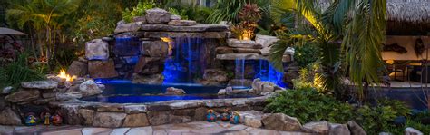 Custom Rock Waterfall Pool Grotto, Spa, Natural Stream, Tiki Hut