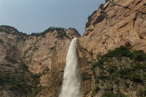 View of a Large Waterfall from the Valley · Free Stock Photo