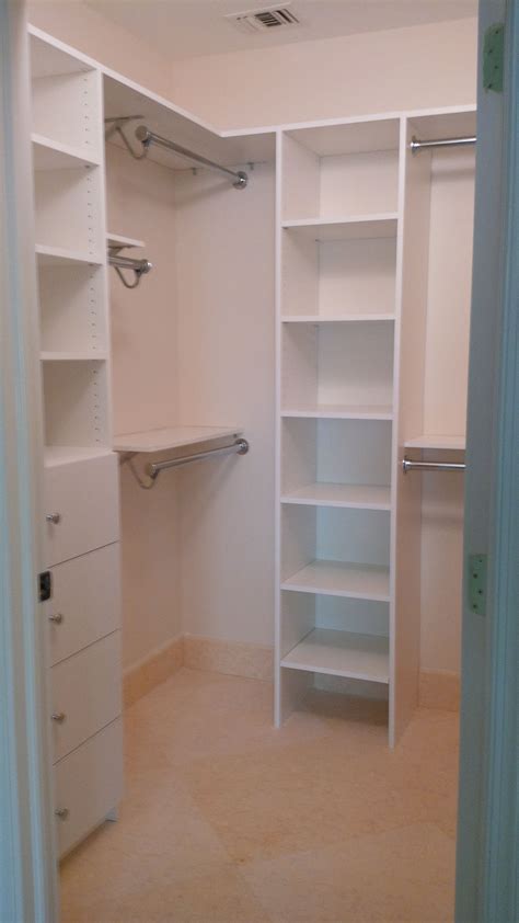 Custom melamine closet system combined with a shelf and rod closet ...