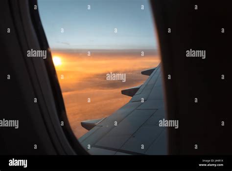 Looking Outside a Window of an Aircraft Cabin: White Airplane Wing and ...