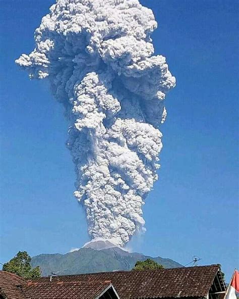 "Merapi volcano erupts sending plume of ash 11.6 km (38 000 feet) above sea level in Indonesia ...