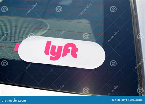 Lyft Pink and White Sticker on Glass of Car Editorial Stock Image ...