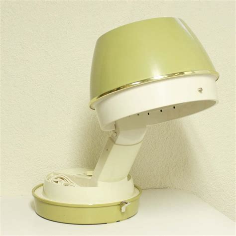 Vintage salon-style hair dryer Dominion Scovill light