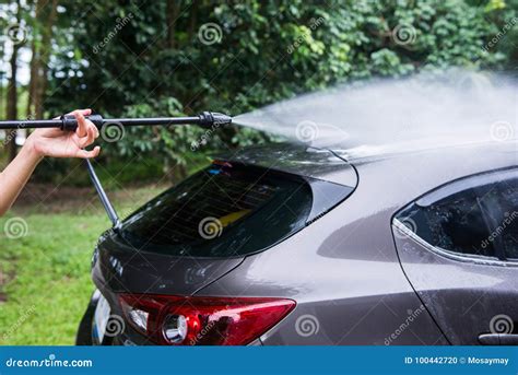 Cleaning Car with High Pressure Water Stock Photo - Image of dirty, spray: 100442720