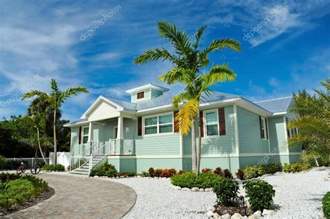 Beach House Stock Photo by ©EyeMark 57659575