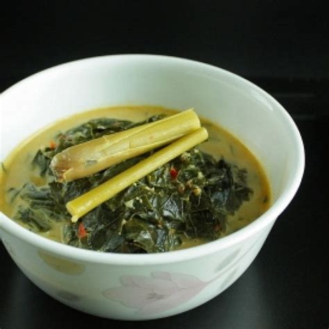 Cassava Leaf Stew. Indonesian cassava leaf stew with spices and coconut ...