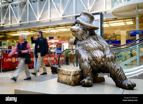 The Paddington Bear statue at Paddington Station, London, England.. Station concourse, forecourt ...