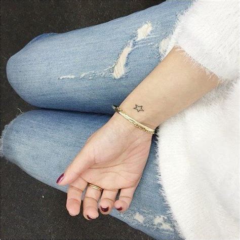 small-star-tattoo-on-wrist | Tiny Tattoo inc.