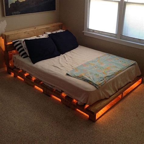 DIY Glowing Pallet Bed Ideas 23 | Pallet bed with lights, Diy pallet bed, Wooden pallet beds