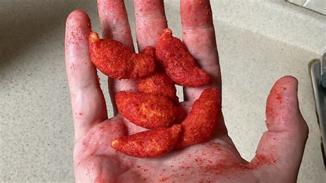 Cheetos Flamin' Hot Smoky Ghost Pepper Puffs Review: This New Snack Won't Set The World On Fire