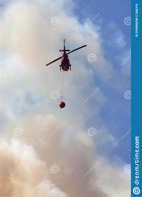 Wildfire Service Helicopter Flying Over BC Forest Fire and Smoke on the ...