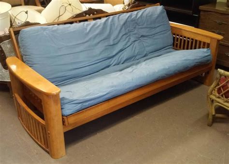 UHURU FURNITURE & COLLECTIBLES: SOLD **REDUCED** Futon with Arm Storage - $75